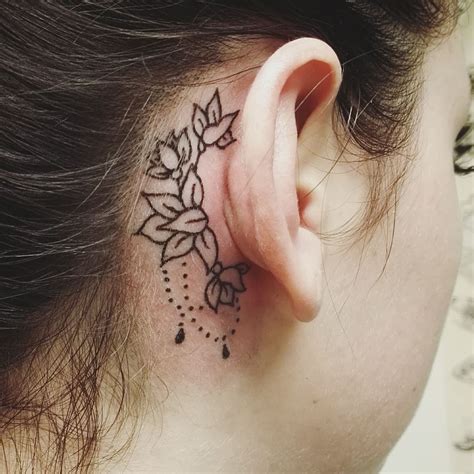 back of ear tattoo|tattoos behind women ear.